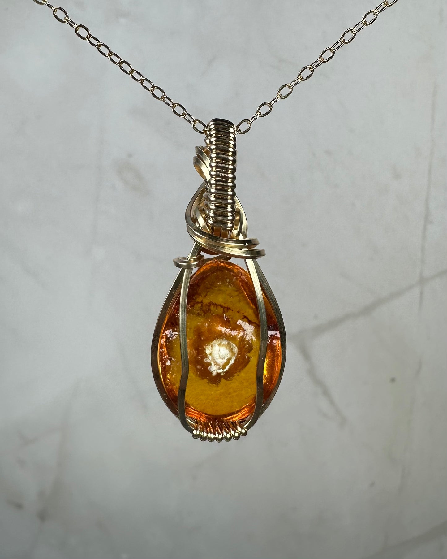 Carved Intaglio Baltic Amber with a Rose Pendant Wire-Wrapped in 14k Goldfill