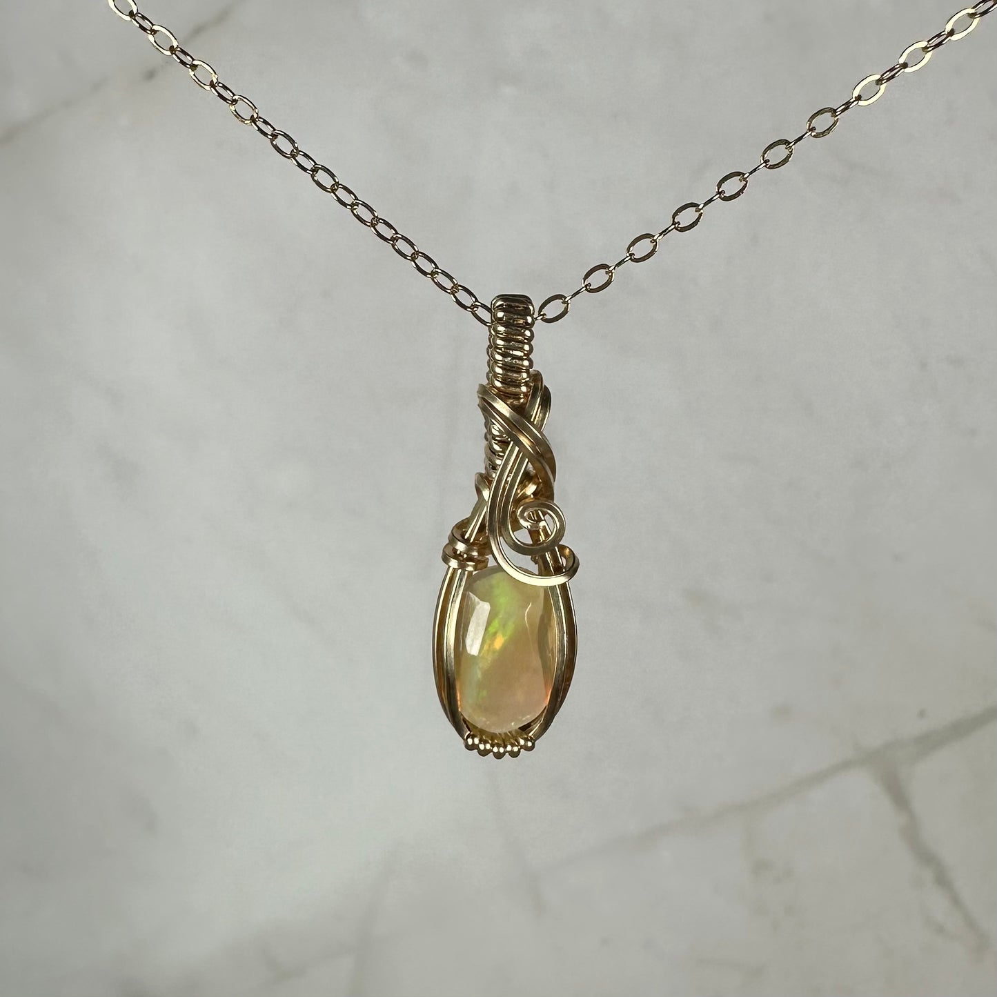 Natural Ethiopian Opal Pendant Wire-Wrapped in 14k Goldfill