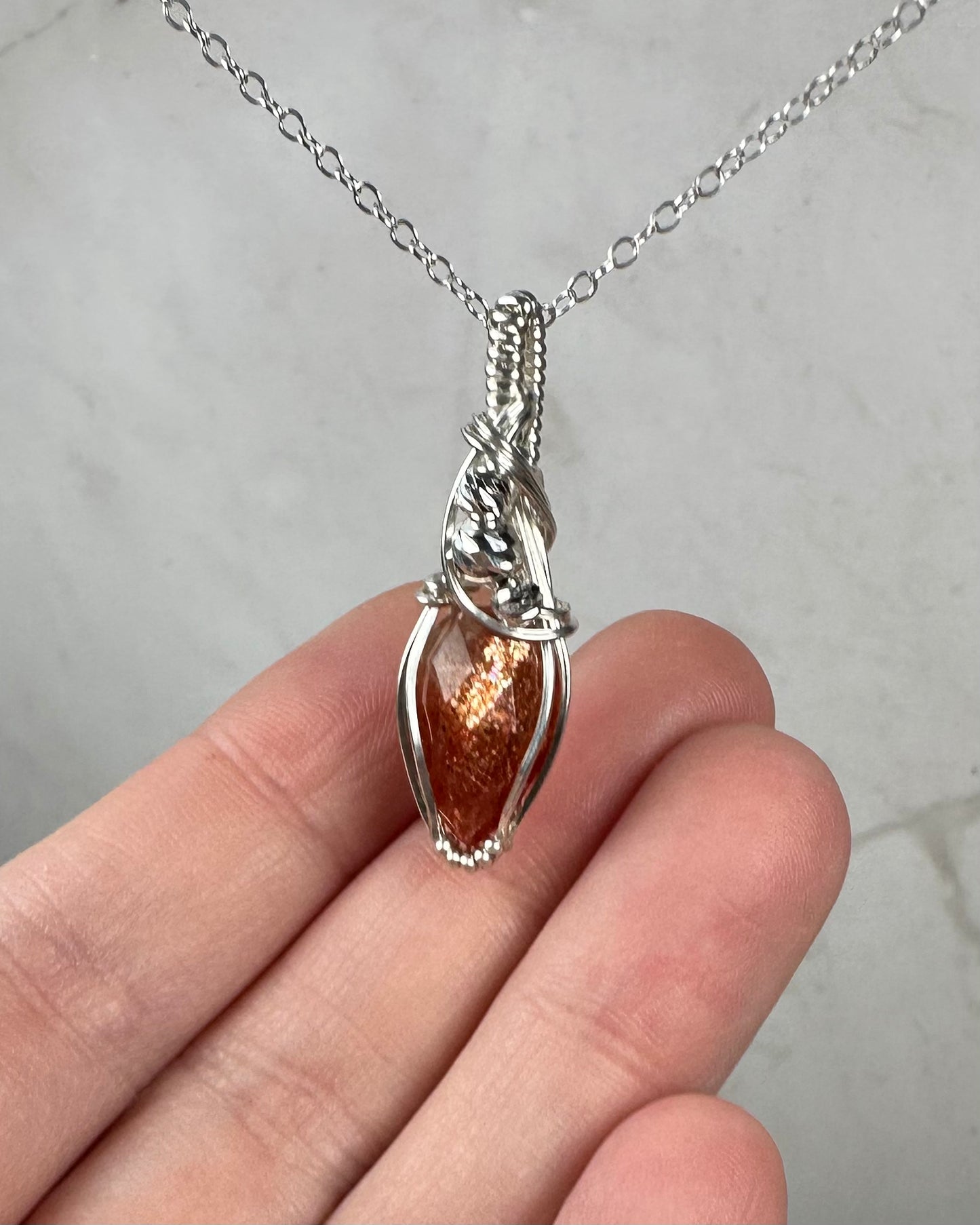 Rosecut Sunstone Pendant Wire-Wrapped in Sterling Silver