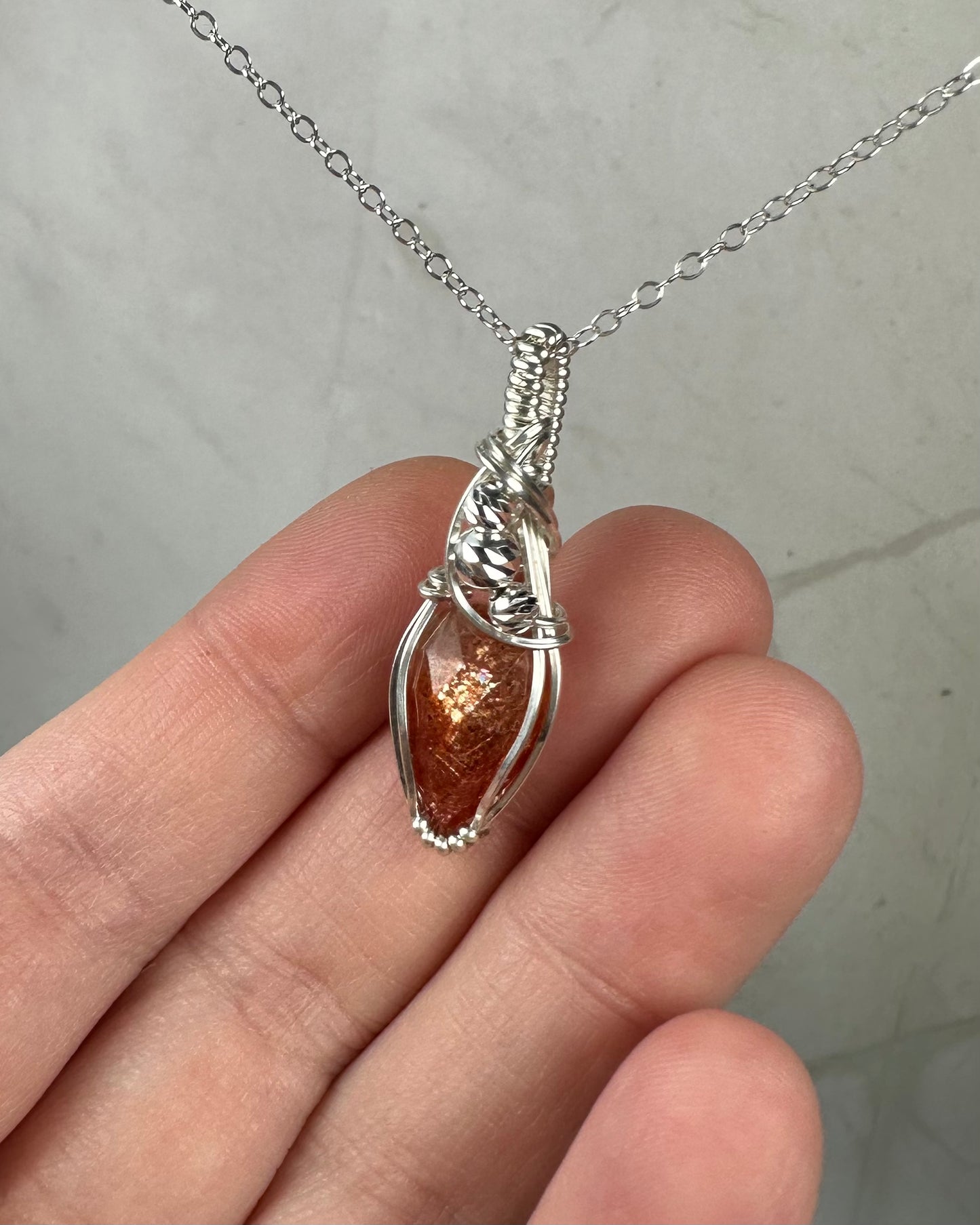 Rosecut Sunstone Pendant Wire-Wrapped in Sterling Silver