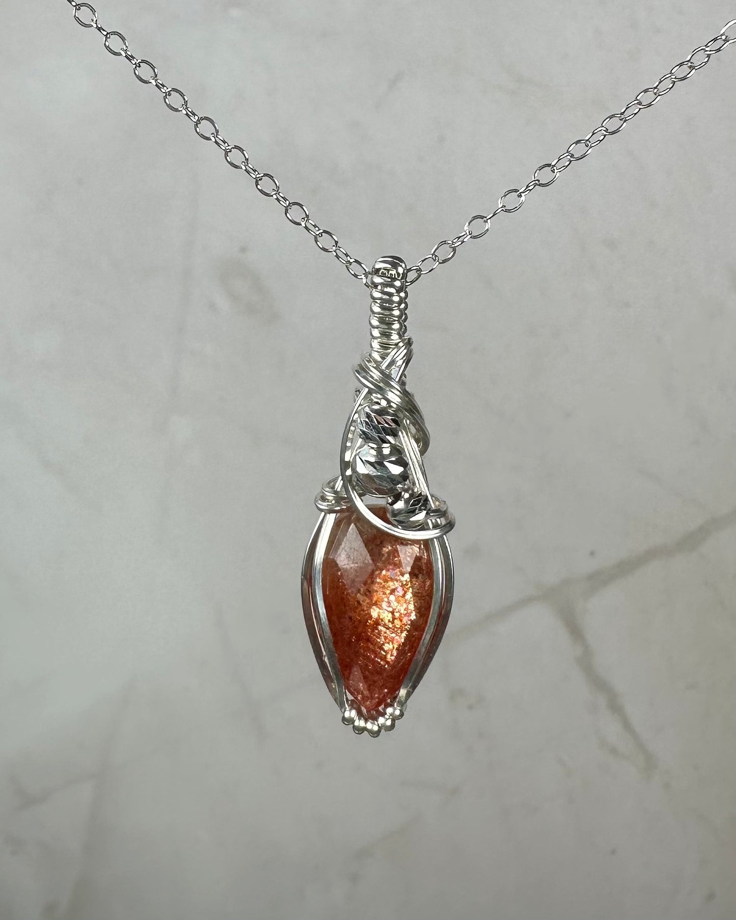 Rosecut Sunstone Pendant Wire-Wrapped in Sterling Silver