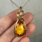 Carved Intaglio Baltic Amber with a Rose Pendant Wire-Wrapped in 14k Goldfill