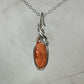 Antique Carved Coral Cameo of Woman Pendant Wire-Wrapped in Sterling Silver