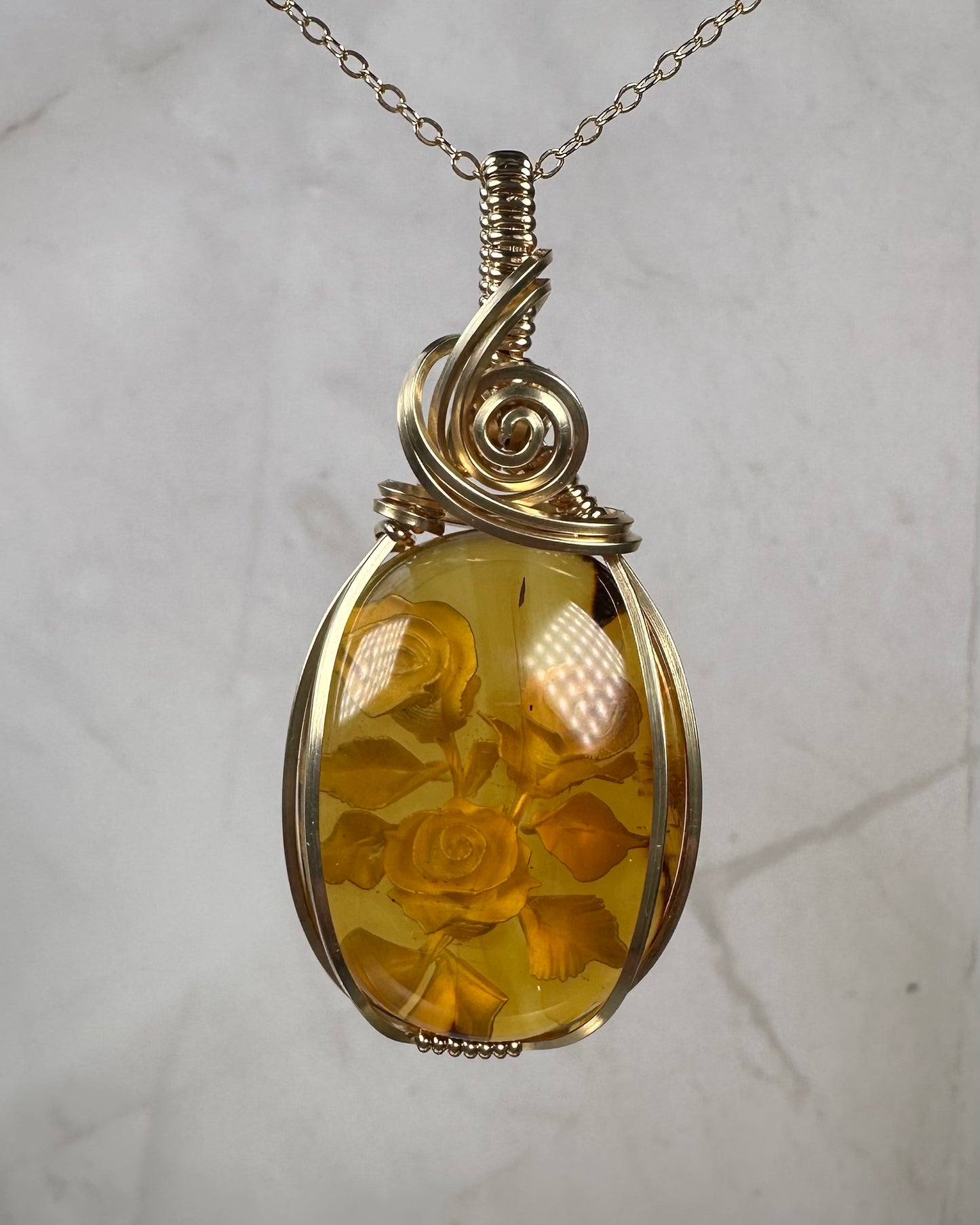 Carved Mexican Amber with Flowers Pendant Wire-Wrapped in 14k Goldfill