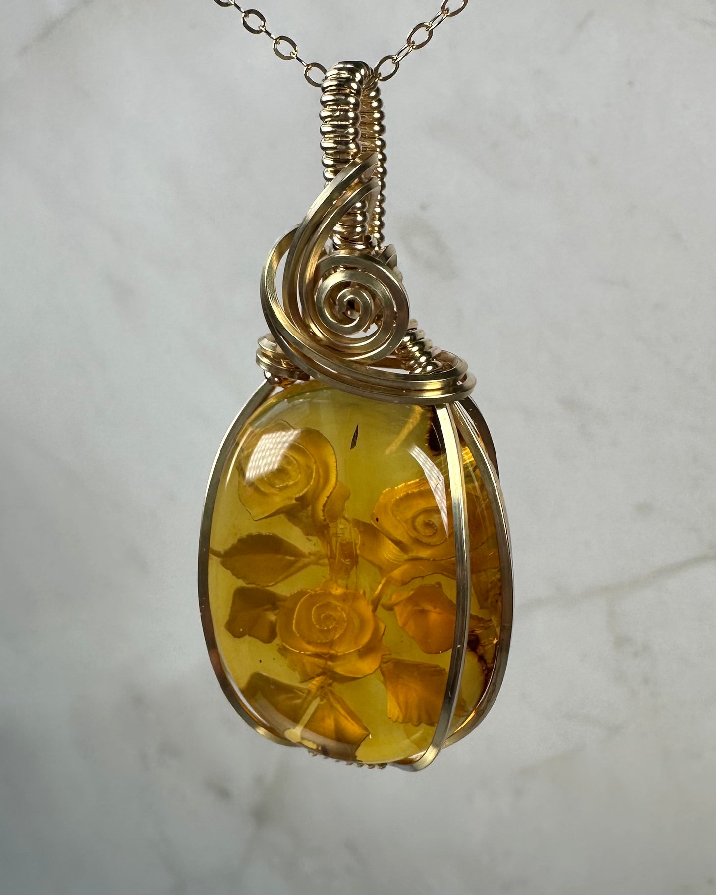 Carved Mexican Amber with Flowers Pendant Wire-Wrapped in 14k Goldfill