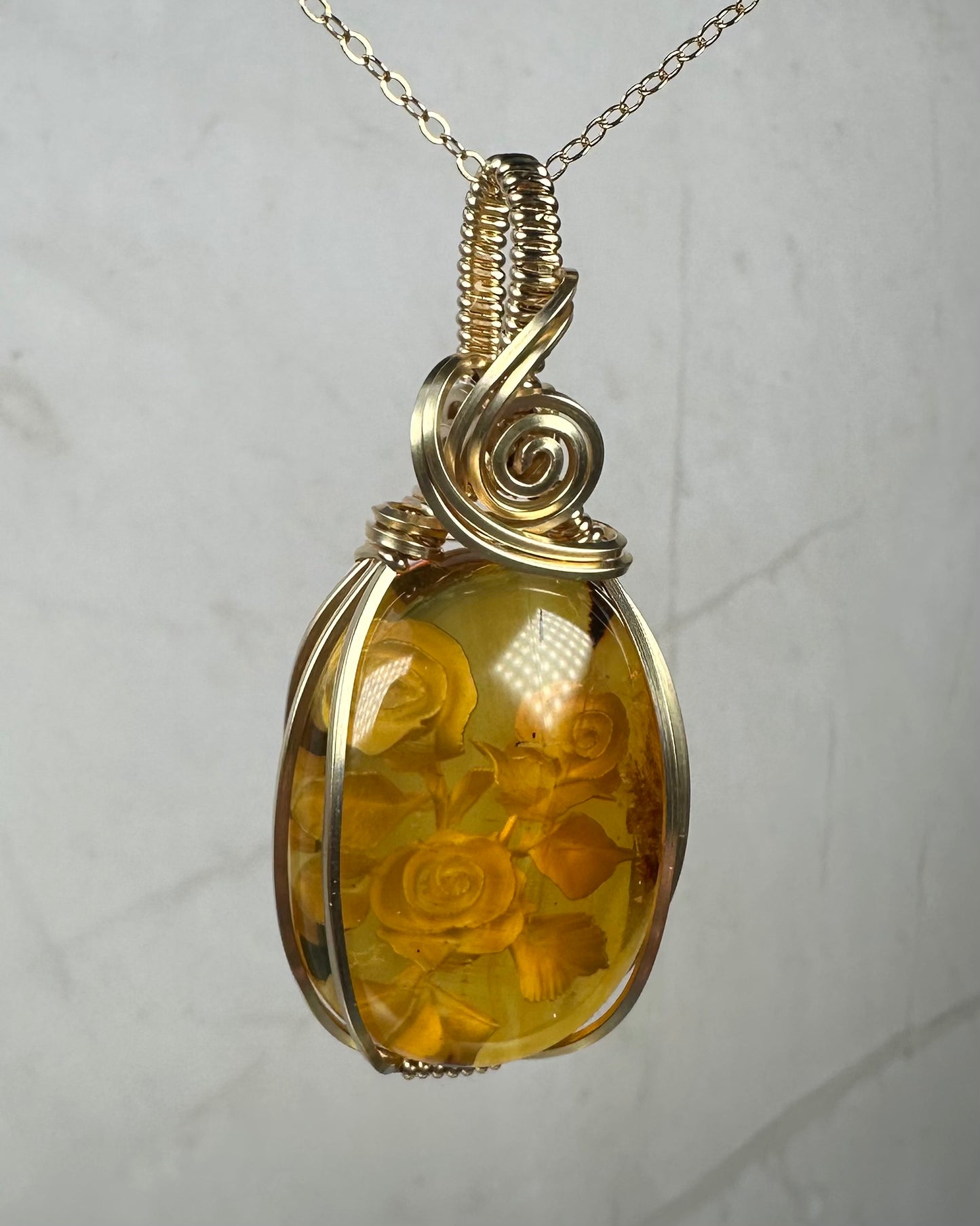 Carved Mexican Amber with Flowers Pendant Wire-Wrapped in 14k Goldfill