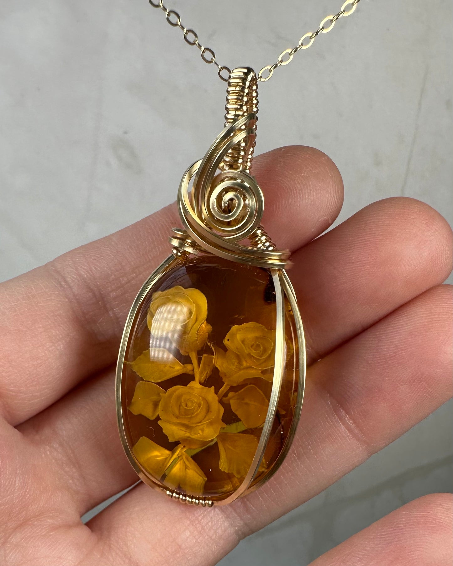 Carved Mexican Amber with Flowers Pendant Wire-Wrapped in 14k Goldfill