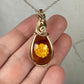 Carved Intaglio Baltic Amber with a Rose Pendant Wire-Wrapped in 14k Goldfill