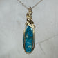 Wire-Wrapped Ithaca Peak Turquoise with Pyrite Pendant in 14k Goldfill