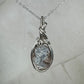 Sterling Silver Wire-Wrapped Vintage Mother of Pearl Carved Cameo Pendant
