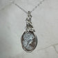 Sterling Silver Wire-Wrapped Vintage Mother of Pearl Carved Cameo Pendant