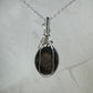 Sterling Silver Wire-Wrapped Vintage Mother of Pearl Carved Cameo Pendant