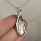 Sterling Silver Wire-Wrapped Vintage Mother of Pearl Carved Cameo Pendant