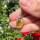 Green/Yellow Tourmaline Pendant Wrapped in Sterling Silver Wire