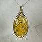 Carved Mexican Amber with Flowers and Butterflies Pendant Wire-Wrapped in 14k Goldfill