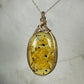 Carved Mexican Amber with Flowers and Butterflies Pendant Wire-Wrapped in 14k Goldfill