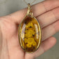 Carved Mexican Amber with Flowers and Butterflies Pendant Wire-Wrapped in 14k Goldfill