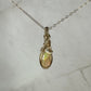 Natural Ethiopian Opal Pendant Wire-Wrapped in 14k Goldfill