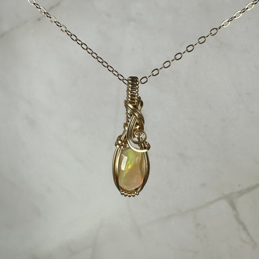 Natural Ethiopian Opal Pendant Wire-Wrapped in 14k Goldfill