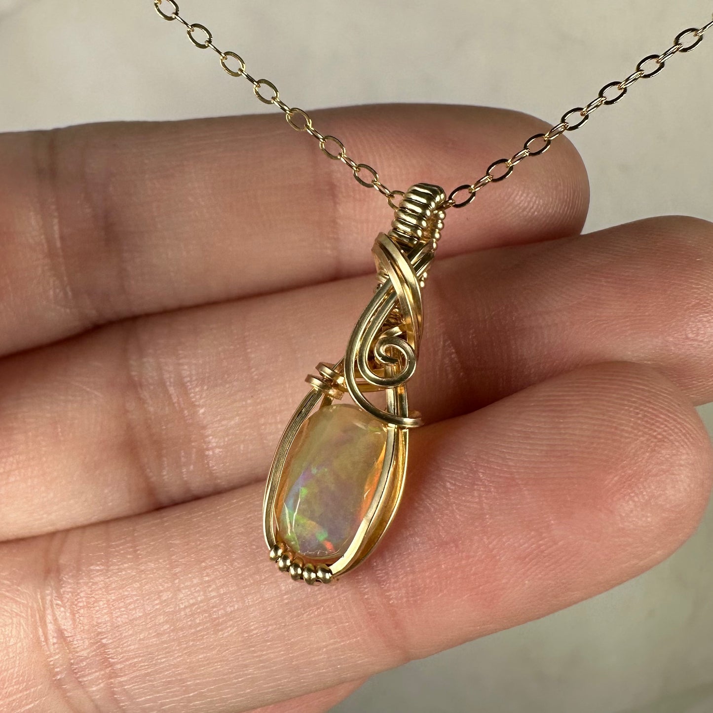 Natural Ethiopian Opal Pendant Wire-Wrapped in 14k Goldfill