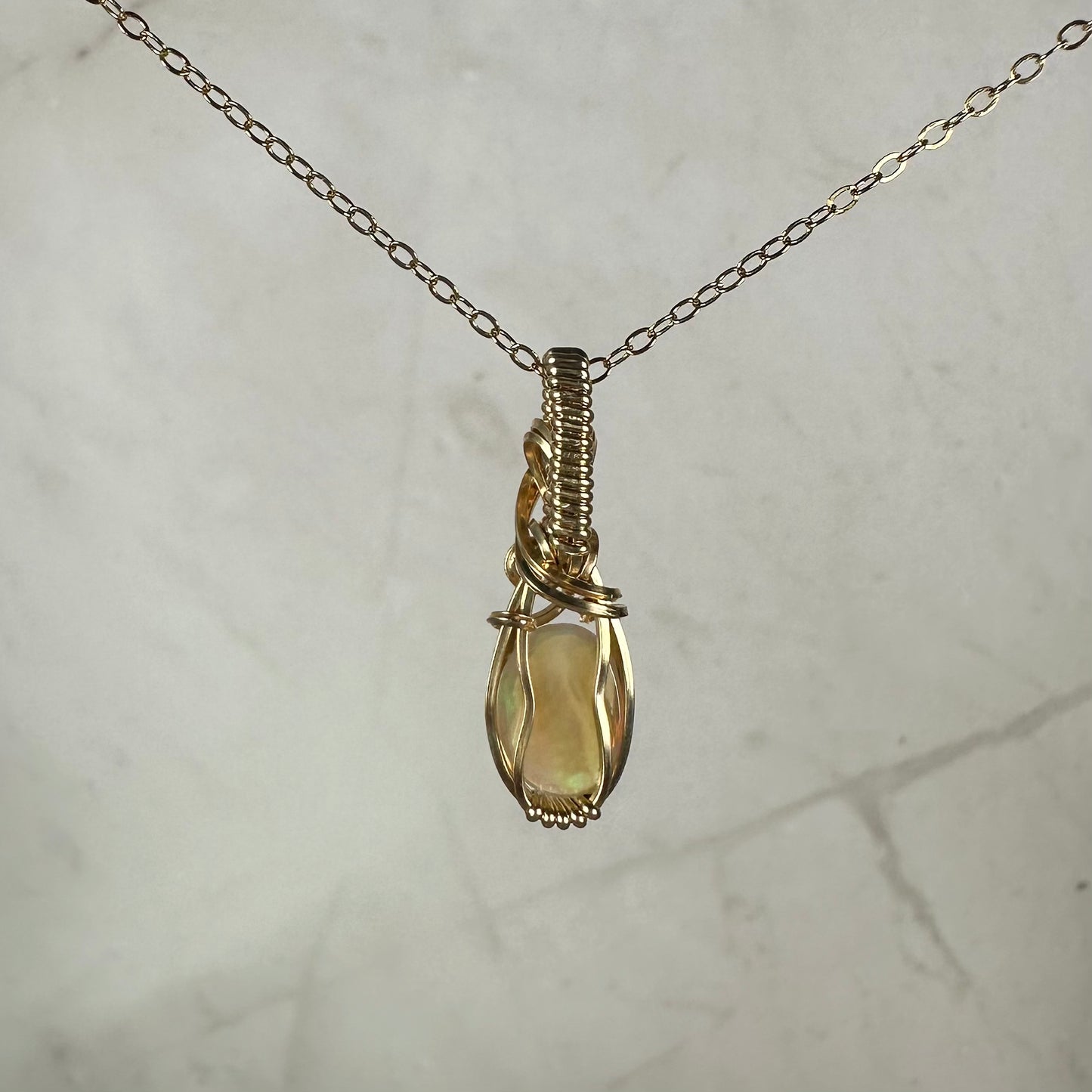 Natural Ethiopian Opal Pendant Wire-Wrapped in 14k Goldfill
