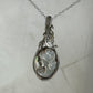Sterling Silver Wire-Wrapped Vintage Mother of Pearl Carved Cameo Pendant