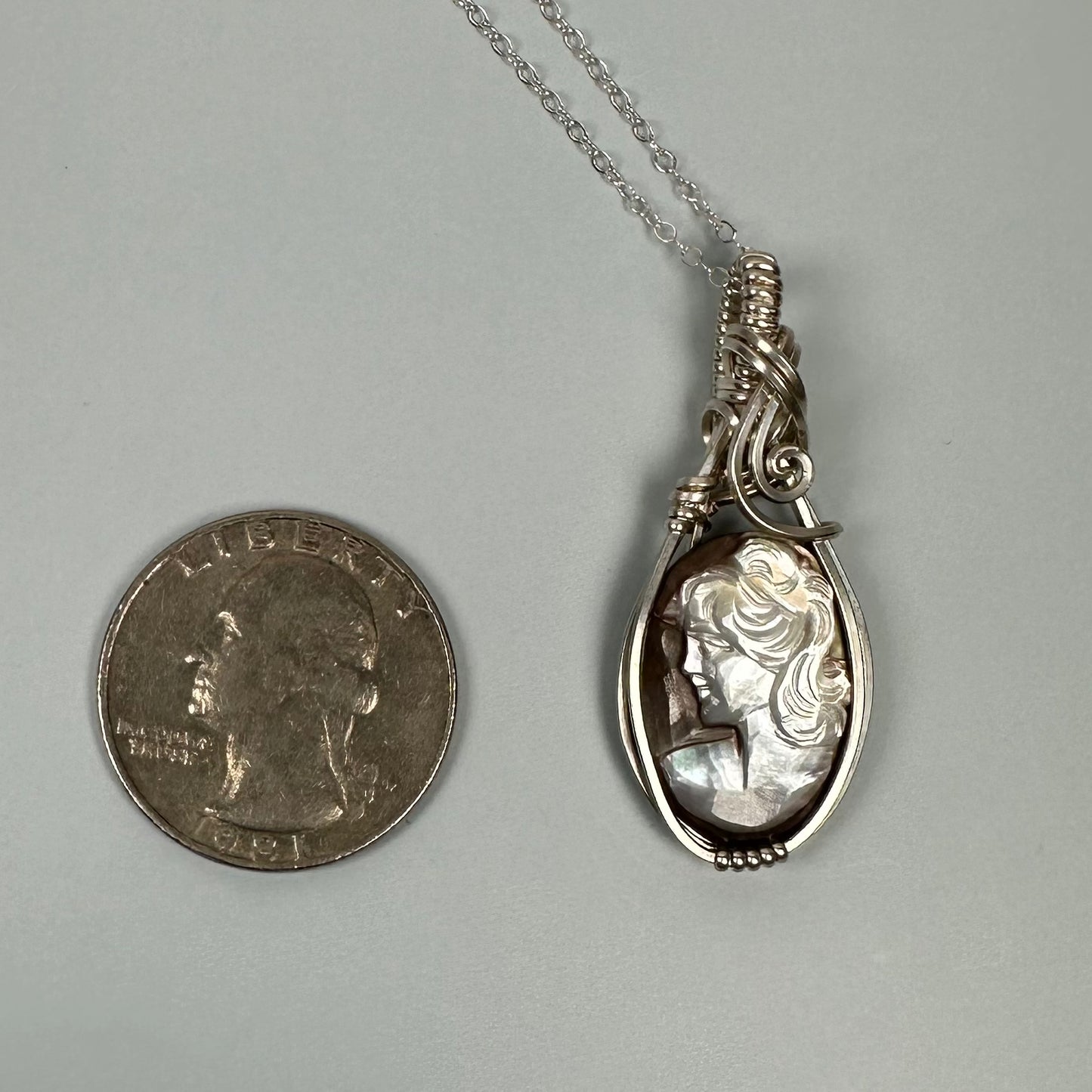 Sterling Silver Wire-Wrapped Vintage Mother of Pearl Carved Cameo Pendant