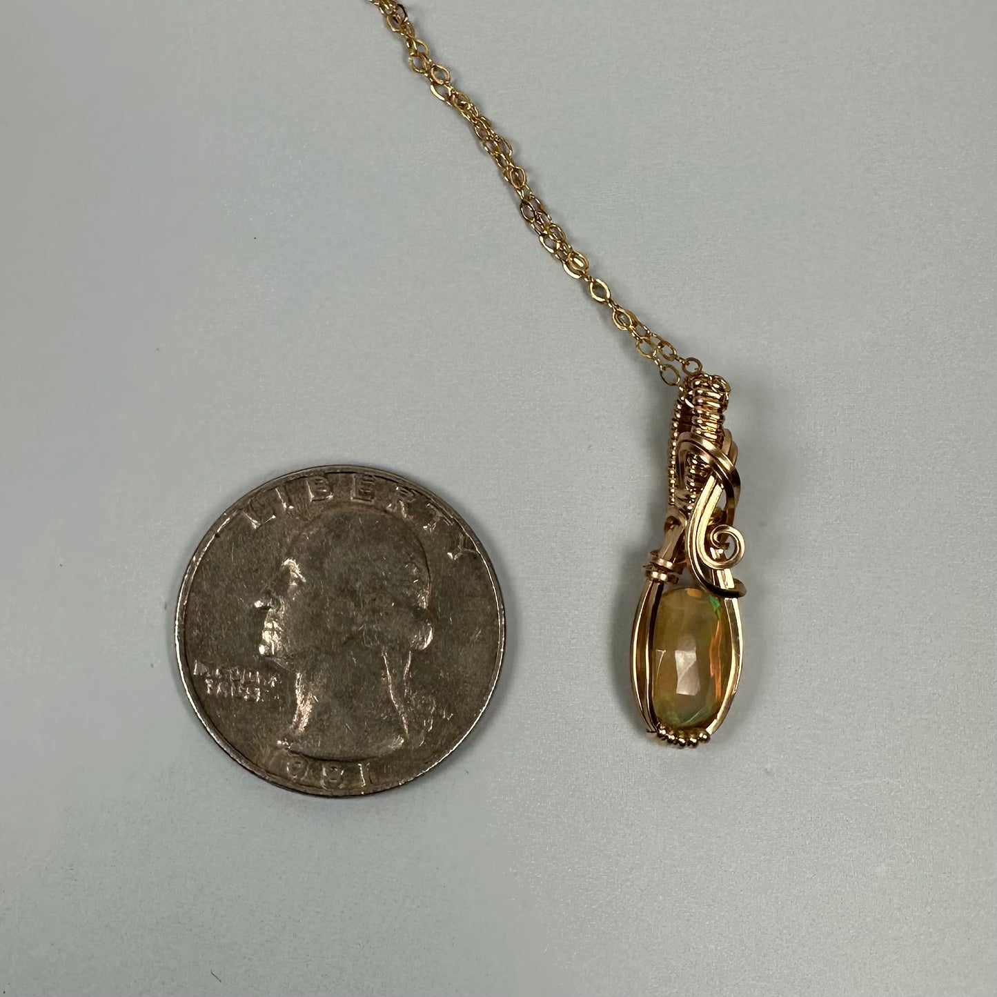 Natural Ethiopian Opal Pendant Wire-Wrapped in 14k Goldfill