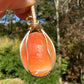 Wire wrapped 14k goldfilled wire pendant of a handcarved shell vintage cameo of a woman with a pearl necklace and flowers