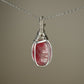 Carved Rhodochrosite Scarab Pendant Wire-Wrapped in Sterling Silver